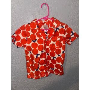Hanna Andersson boys button-up shirt in the "Tangerine Dream" print